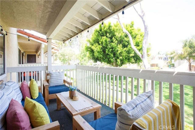 balcony featuring an outdoor living space