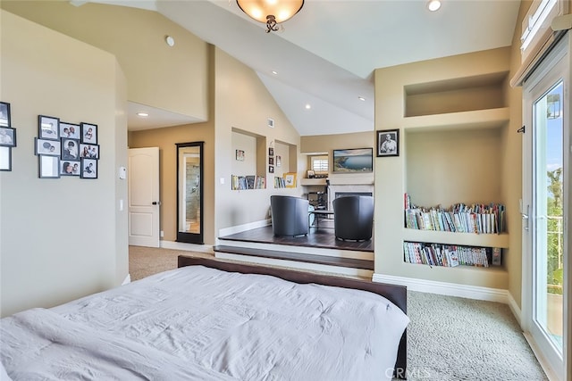 carpeted bedroom with access to exterior, multiple windows, and high vaulted ceiling