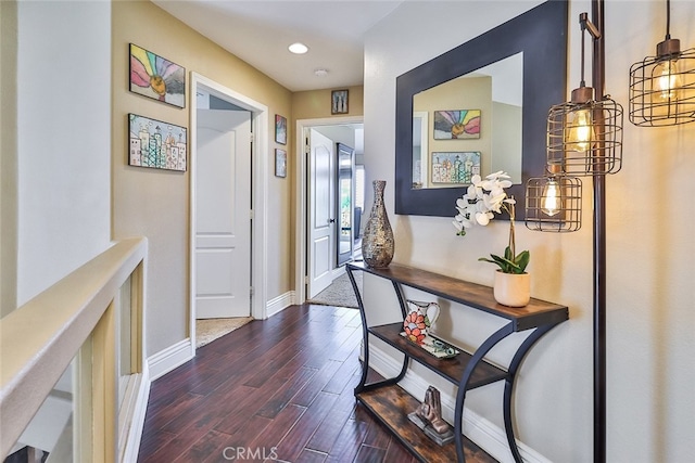 hall featuring dark wood-type flooring