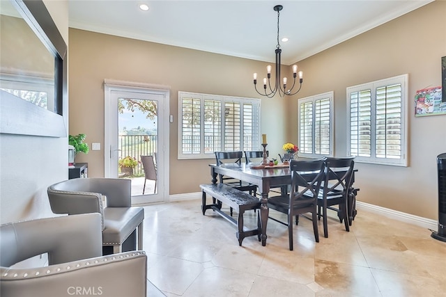 tiled dining area with crown molding, a chandelier, and a wealth of natural light