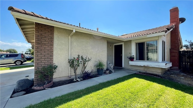 ranch-style home with a front yard