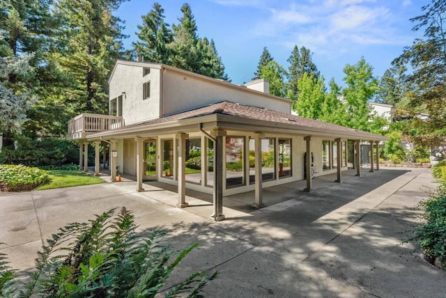 view of community with a patio