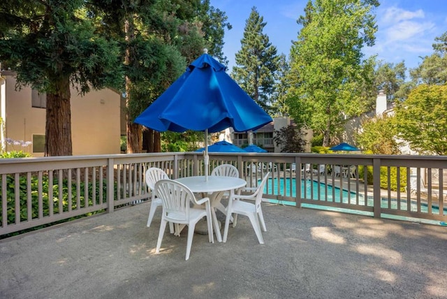 view of patio / terrace featuring a community pool