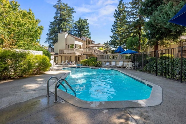 view of pool with a patio area