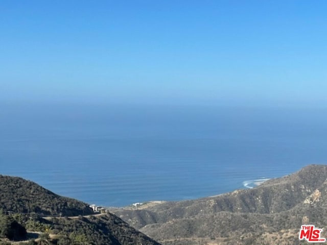 property view of water featuring a mountain view