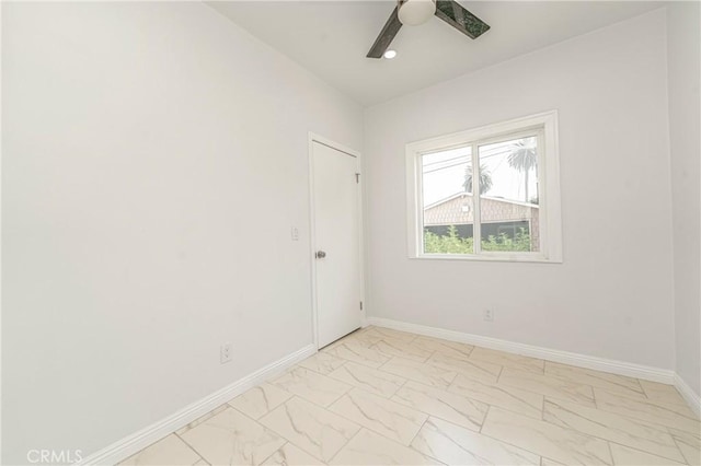 empty room featuring ceiling fan