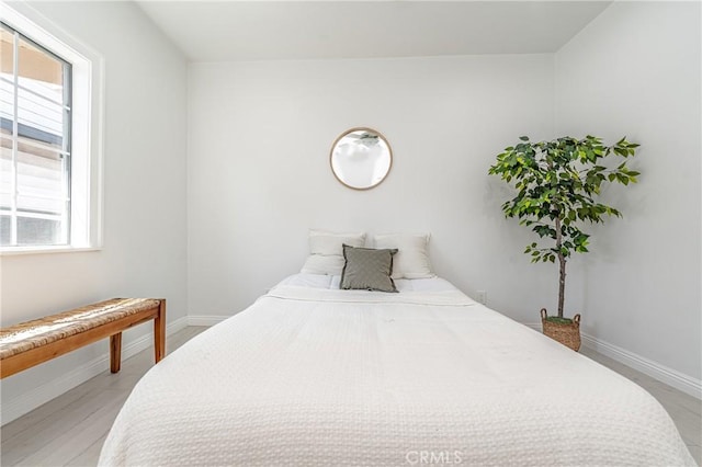 bedroom featuring light hardwood / wood-style floors