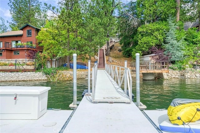 dock area with a water view