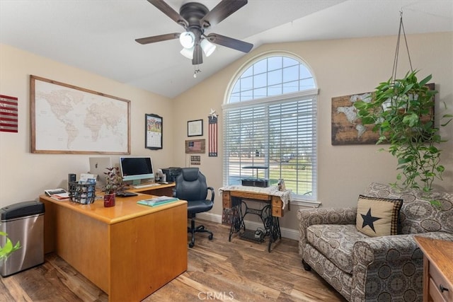 office area with ceiling fan, lofted ceiling, and wood-type flooring