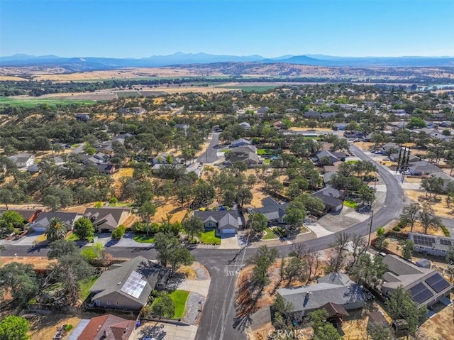 drone / aerial view featuring a mountain view