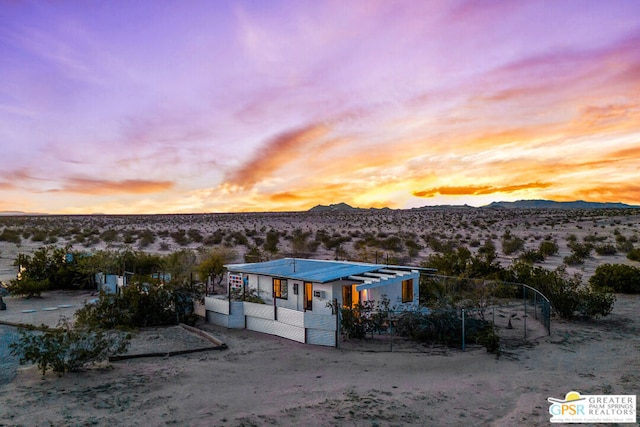 view of front of home featuring a mountain view