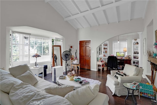 living room featuring dark hardwood / wood-style flooring, beamed ceiling, and high vaulted ceiling