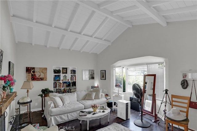 living room featuring beam ceiling, dark wood-type flooring, and high vaulted ceiling