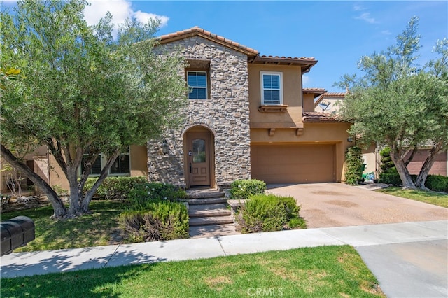 view of front facade featuring a front yard and a garage