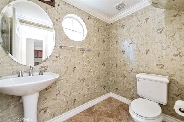 bathroom featuring ornamental molding, tile patterned flooring, sink, and toilet