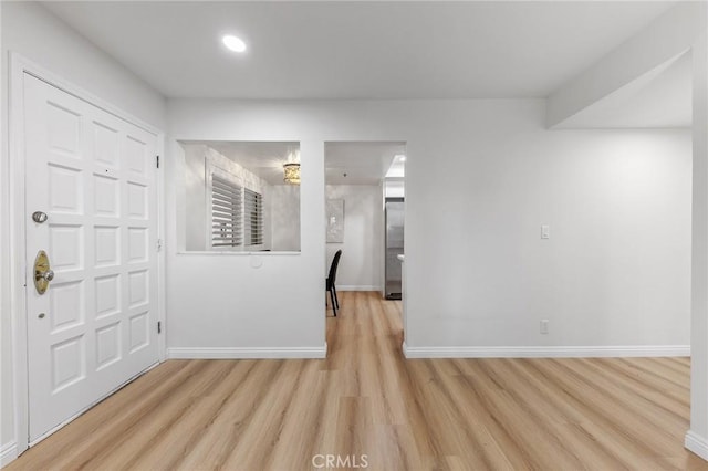 foyer featuring light wood-type flooring