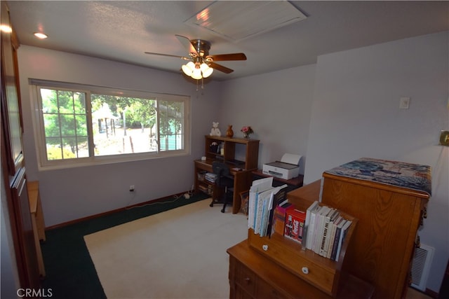 misc room featuring ceiling fan and carpet