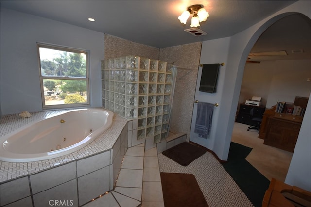 bathroom with plus walk in shower and tile patterned floors