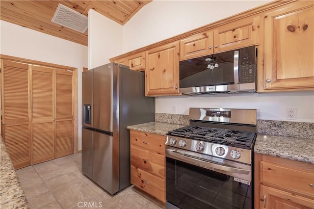 kitchen featuring lofted ceiling, light stone countertops, stainless steel appliances, and wood ceiling