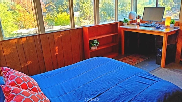 bedroom with wooden walls