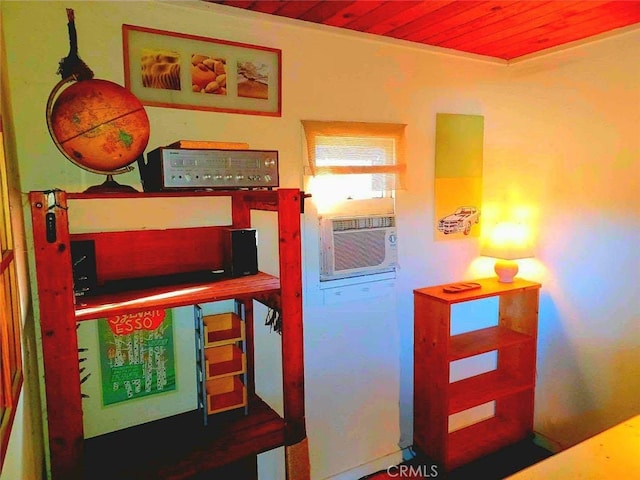 bedroom with cooling unit and wood ceiling