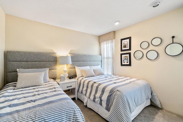 bedroom featuring carpet flooring