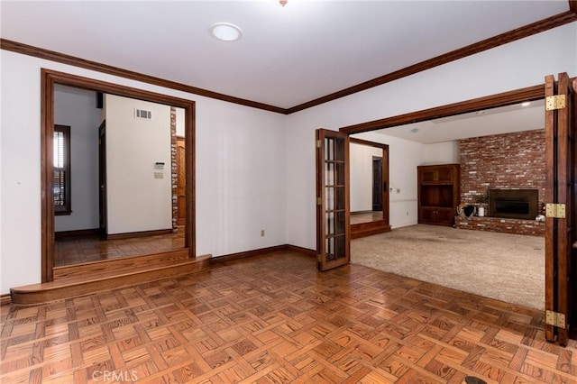 unfurnished living room with parquet floors, ornamental molding, and a brick fireplace