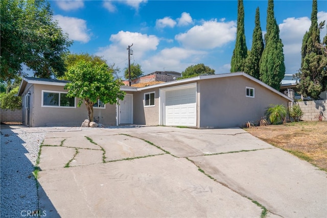 ranch-style house with a garage