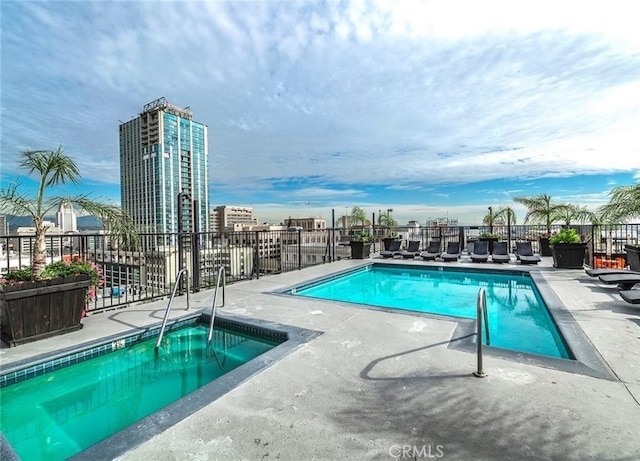 view of swimming pool featuring a patio