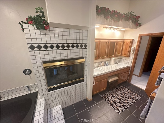 bathroom with tile patterned floors