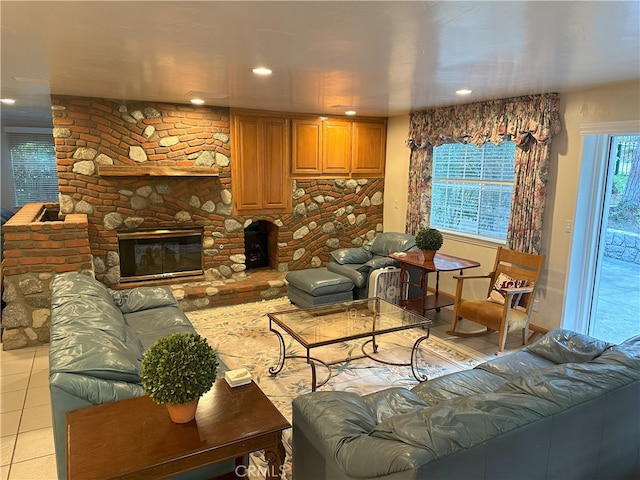 living room featuring light tile patterned floors and a fireplace