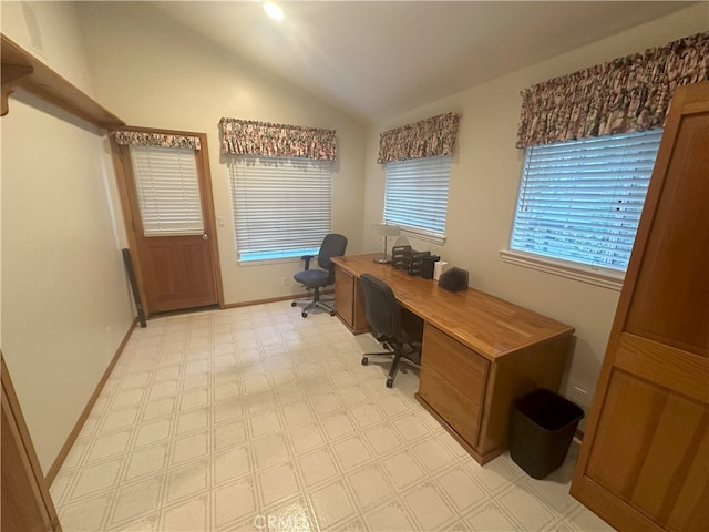 office space featuring vaulted ceiling