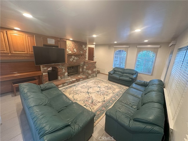 tiled living room with a brick fireplace