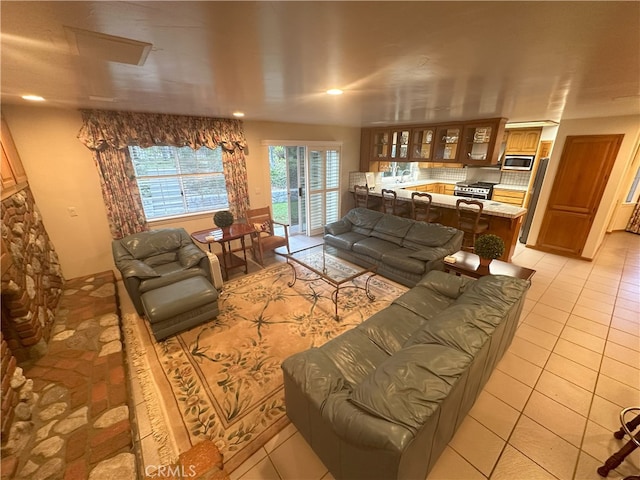 living room with light tile patterned floors