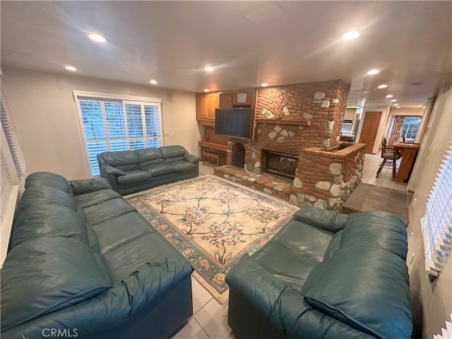 tiled living room with a fireplace