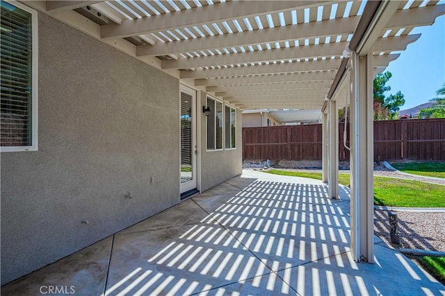 view of patio featuring a pergola