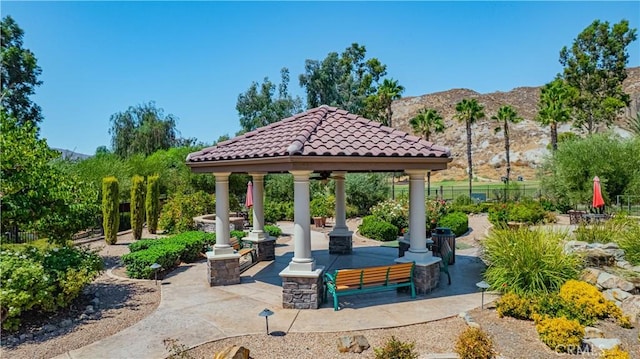 view of community featuring a gazebo and a mountain view