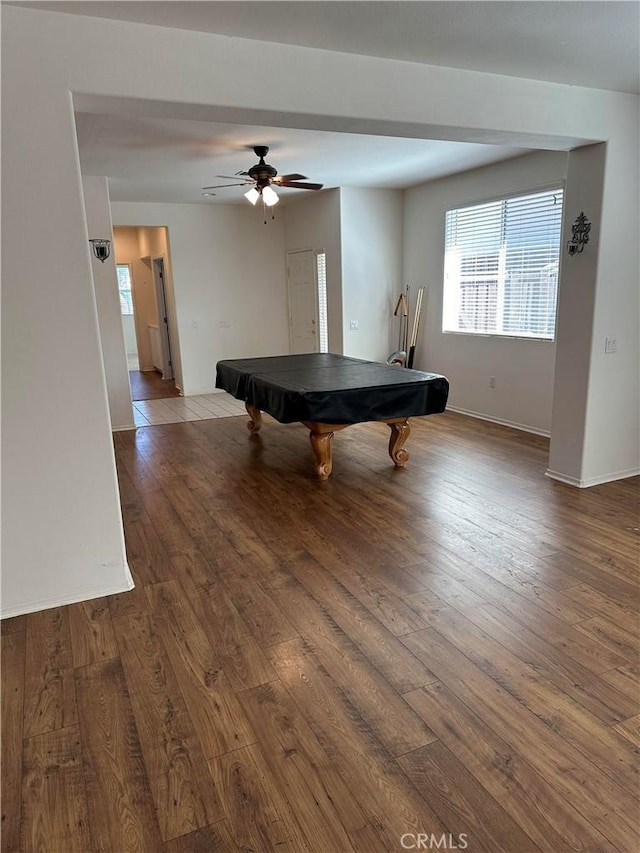 recreation room with hardwood / wood-style floors, ceiling fan, and pool table