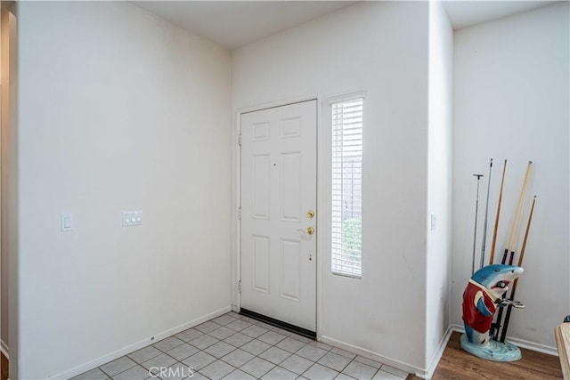 entrance foyer with light tile patterned flooring