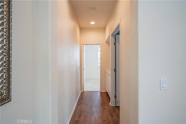 hallway featuring dark hardwood / wood-style floors