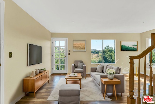 living room with a healthy amount of sunlight and light wood-type flooring