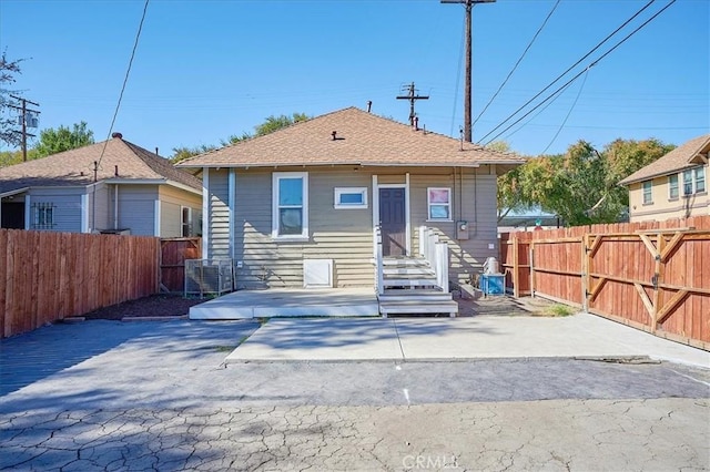 rear view of house with a patio