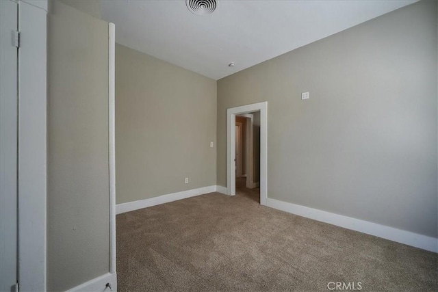 view of carpeted spare room