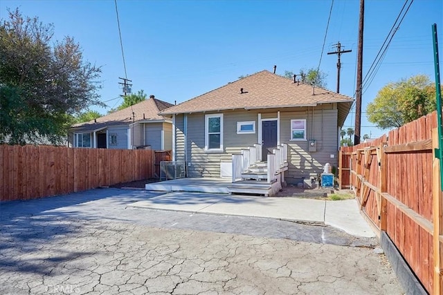 back of house with a patio area