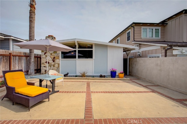 rear view of house featuring a patio area