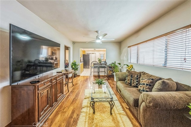 3927 W 58th Pl, Los Angeles, CA 90043 - living area featuring a ceiling fan and light wood finished floors