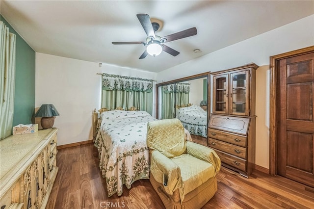 3927 W 58th Pl, Los Angeles, CA 90043 - bedroom featuring wood finished floors, baseboards, and ceiling fan