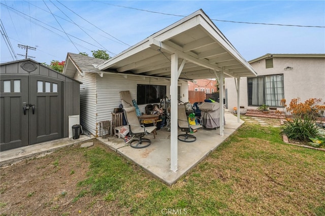 3927 W 58th Pl, Los Angeles, CA 90043 - rear view of property featuring a patio area and a lawn