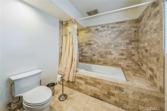 bathroom featuring shower / bathtub combination with curtain, toilet, and tile patterned floors