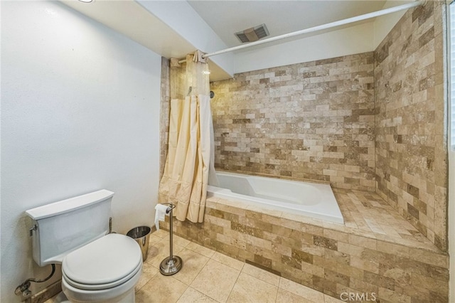 3927 W 58th Pl, Los Angeles, CA 90043 - bathroom featuring tile patterned floors, toilet, and tiled shower / bath
